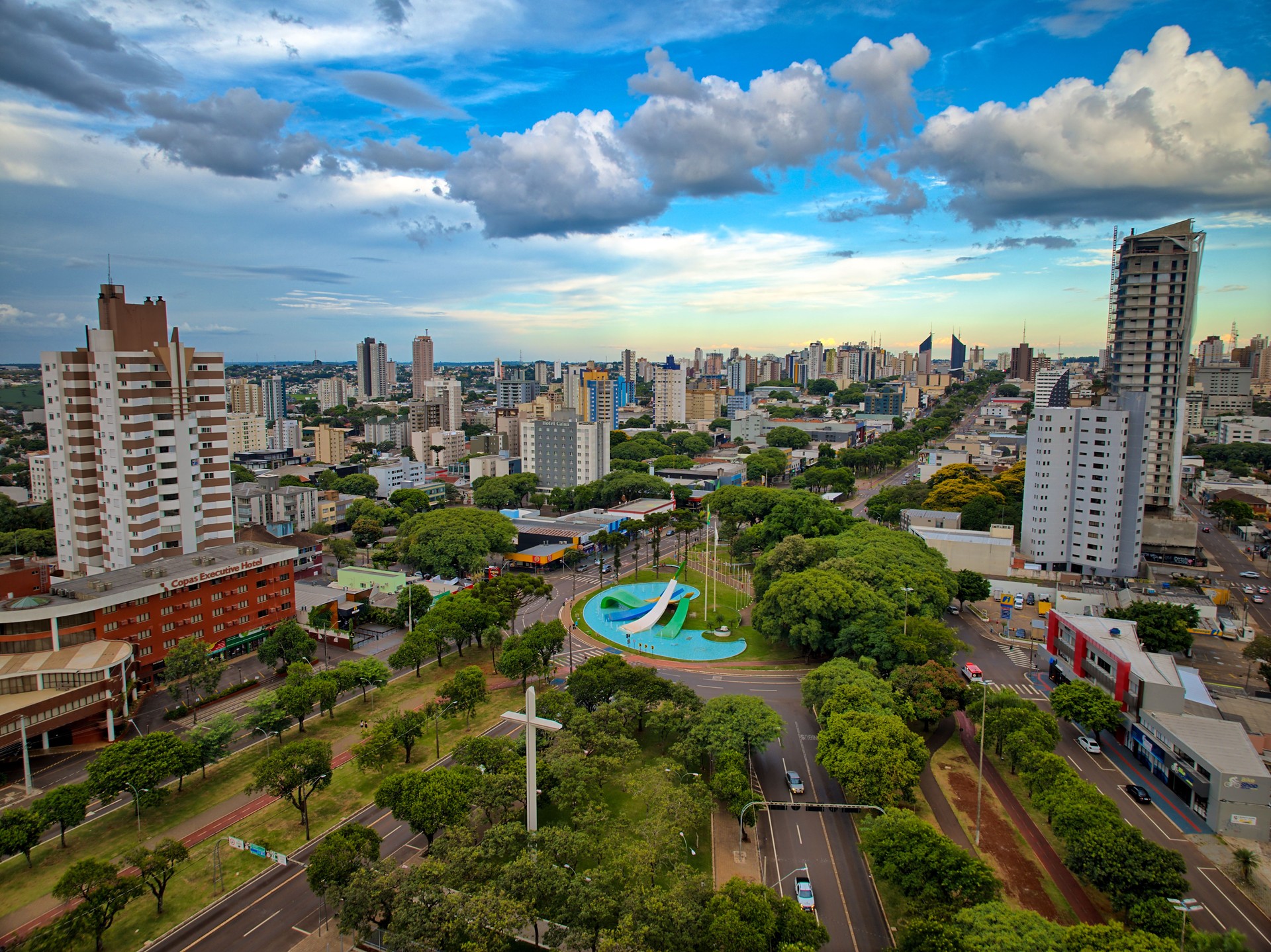 Aerial view of the city of Cascavel, Paraná, Brazil. Clear and beautiful day with spectacular blue sky and clouds. Image of the migrant square.